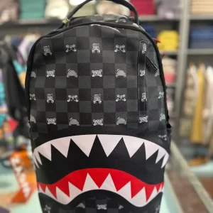 Gray peeking character check backpack sprayground