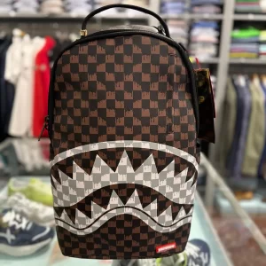 Brown and cream drip check shark backpack sprayground