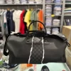CENTER RIP REVEALING GRAY CHECK MINI DUFFLE SPRAYGROUND 2_risultato