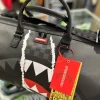 CENTER RIP REVEALING GRAY CHECK MINI DUFFLE SPRAYGROUND 4_risultato